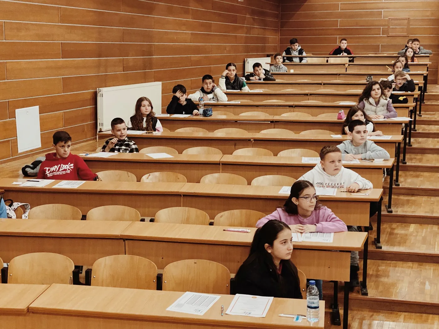 Students spaced out in an examination hall